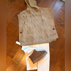 Tan Cable Knit Poncho with White Pants and Brown Boots